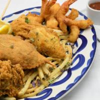 Ultimate Seafood Platter · Stuffed crab, Crispy Fish, Fried Shrimp, Cornmeal Oysters; Served with Crispy French Fries a...