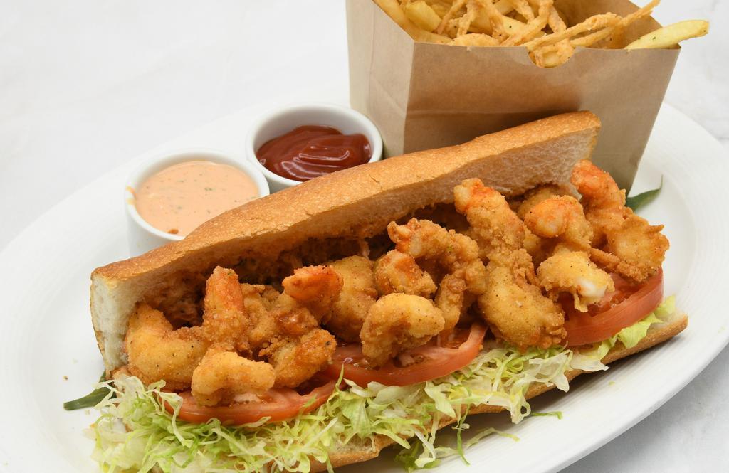 Po-Boy · Fried Shrimp or Oysters, Toasted Bun, Lettuce, Tomatoes, Red Onion, & Remoulade; Served with French Fries & Onion Strings