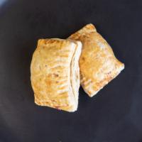 Beef Puffs · Flaky, buttery meat pastry. Filled with minced beef, spices and onions. 

Its addicting.