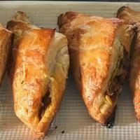 Chicken Puffs · Flaky, buttery chicken pastry. Filled with minced chicken, spices and onions. 

Our best sel...