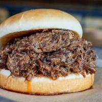 Chopped Beef Brisket · Our beef brisket, chopped and mixed with a touch of Norma Jean's bbq sauce. Meat only, bun n...