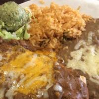 Chimichanga A Mucho Grande · Flour tortilla stuffed with chicken or beef, cheese, and beans, deep fried, topped with ranc...