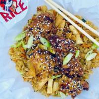 Sesame Chicken Fried Rice · Fried chicken glazed with sweet sesame glaze, bell peppers, onion, carrot, cabbage.