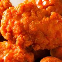 10 Boneless Wings · 10 Fried Boneless Wings with choice of side and dipping sauce