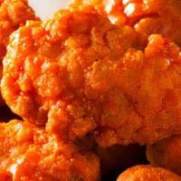 20 Boneless Wings · 20 Fried Boneless wings with your choice of two sides and dipping sauces