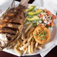 Mojarra Frita · Whole tilapia deep-fried. Served with french fries and rice.