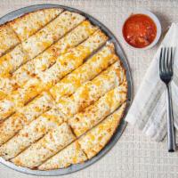 Large Cheese Sticks · 14'' comes with 4oz of Gatti's garlic butter.
