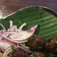 Mutton Kola Urundai · Deep-fried spiced goat meatballs.