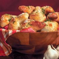 Homemade Garlic Knots · Hand-knotted pizza dough tossed with Sicilian extra virgin olive oil, fresh garlic and Roman...