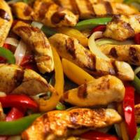 Chicken Skillet · Fajita style! Served with sautéed onions, green peppers tomatoes and rice or fries and a min...