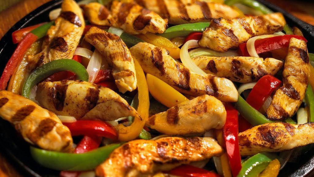 Chicken Skillet · Fajita style! Served with sautéed onions, green peppers tomatoes and rice or fries and a mini Athenian salad.