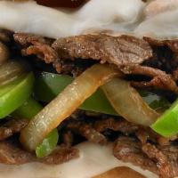 Philly Pita · Containing your choice of gyro, chicken or pork melted cheese and sautéed onions and green p...