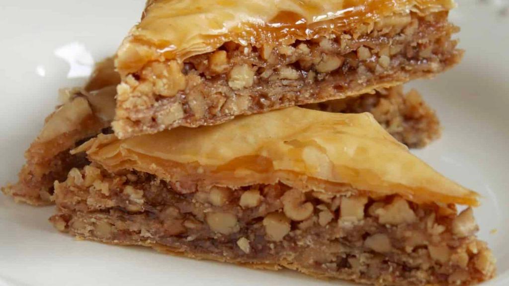 Baklava · Phyllo walnuts and cinnamon topped with our honey syrup.