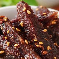 麻辣牛肉干/ Sichuan Mala Beef Jerky · Spicy.
