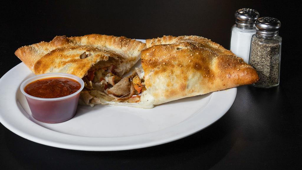Calzones · Filled with ricotta cheese and your choice of ham or sausage.