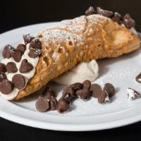 Cannoli · Sweet filled shell with chocolate chips on the ends with powdered sugar., made to order fresh