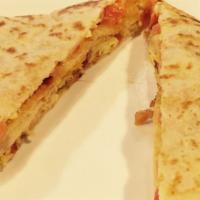 Mattina Crepe · Bacon or sausage with eggs and cheddar jack cheese.
