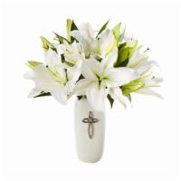 The Ftd® Faithful Blessings™ Bouquet · The symbolic white lily shares meaningful messages with your loved ones during times of joy ...