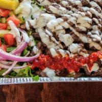 Beef Shawarma Plate · Beef Shawarma comes with rice, veggies (lettuce, tomatoes, pickle, onion, cucumber) and pita...
