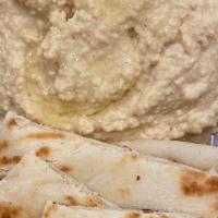 Hummus With Pita · Classic Hummus comes with sliced pita bread. Pick your sauces