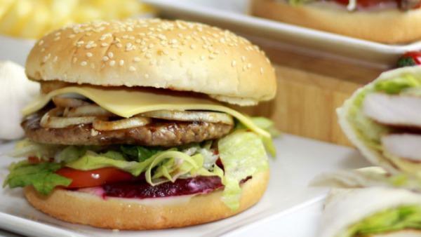 Cheeseburger · Beef pattie comes with lettuce, tomatoes, onions, pickles, and cheese. Pick your sauces.