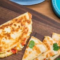 Vegetarian Quesadilla · One flour tortilla filled with cheese, Pinto beans, onions, tomatoes, Green peppers, cilantr...