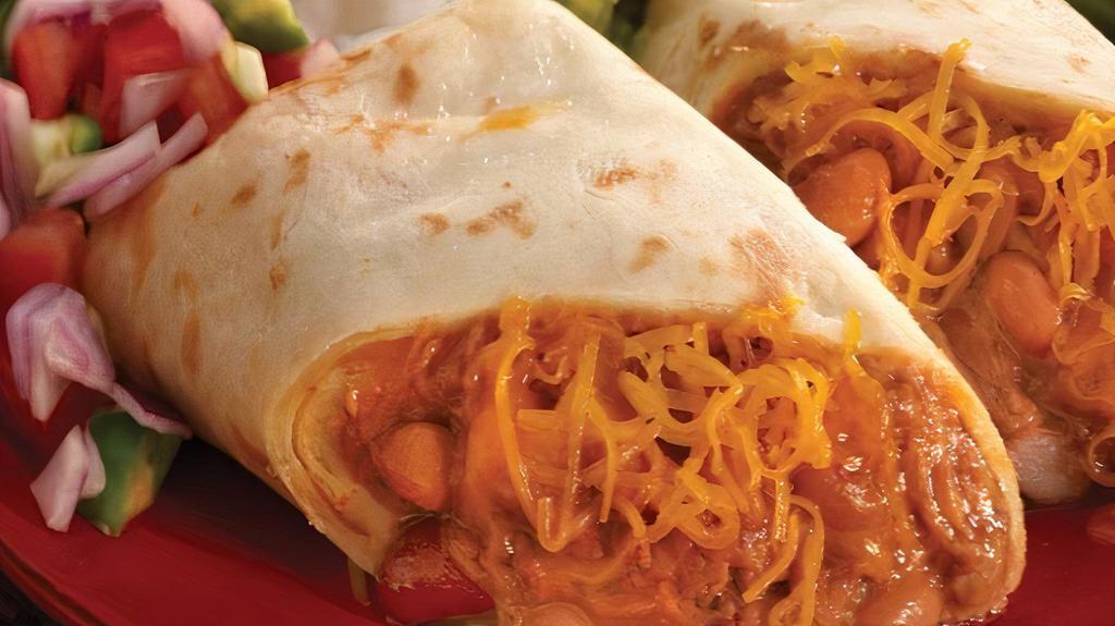 Bean And Cheese Burrito · 10inch Flour filled tortilla with refried beans and cheese served with Tzatziki a creamy and tangy sauce or mild red salsa.