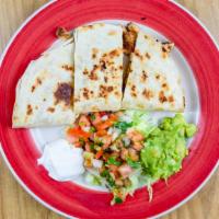 Quesadillas · Your choice of beef or chicken fajita with cheese served with guacamole sour cream and pico ...