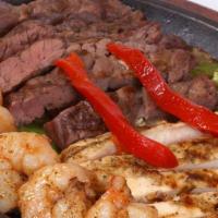 Fajitas A La Diabla · Choice of beef, chicken or pork fajitas, cooked in spicy sauce, served with guacamole, rice,...