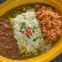 Enchilada Plate · Two or three enchiladas with rice, beans, and tortillas.