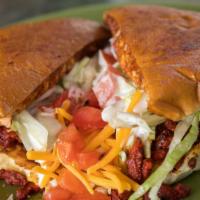 Torta · Served with your choice of meat, lettuce, onion, avocado, tomato, cheese, and sour cream.