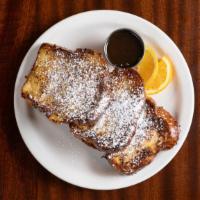 French Toast Grilled Cheese · Challah French toast, melted cheeses, bacon and warm maple butter syrup. Served with Home Fr...