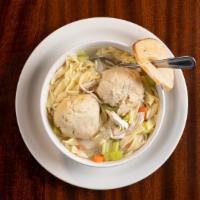 Chicken Matzoh Ball Soup Bowl · Matzoh balls, vegetables, shredded chicken,  and egg noodles