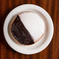 Black & White Cookie · Huge soft white cookie covered with chocolate and vanilla ganache