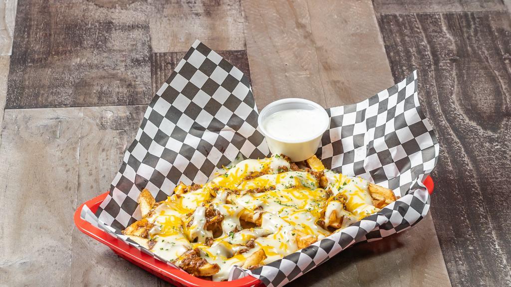 Texas Chili Cheese Fries · Served with chili, white melted and shredded cheddar cheese, bacon and blends house-made ranch.

Note: To receive ranch sauce, ensure to select the sauce option!