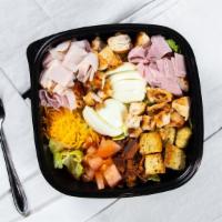 Chef Salad · Traditional american salad tossed with mixed greens, ham, turkey, hard-boiled eggs, tomatoes...