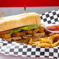 Shrimp Po-Boy · Served with lettuce, tomatoes, cheese and your choice of dressing and a side of freshly cut ...