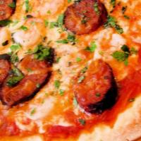 10 Inch Cajun Pizza · FREE TOPPINGS OF : Cajun Sausage • Cajun Shrimp • Cajun Chicken • Bell Pepper • Onions • Jal...