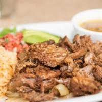 Carnitas · Pork shoulder seasoned and cooked in its own juices, served over a bed of grilled onions and...