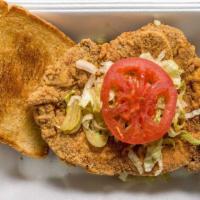 Pork Chop Basket · Deep Fried Battered or Grilled Pork Chop serve on Toasted Texas Toast with Mayo, Lettuce Tom...