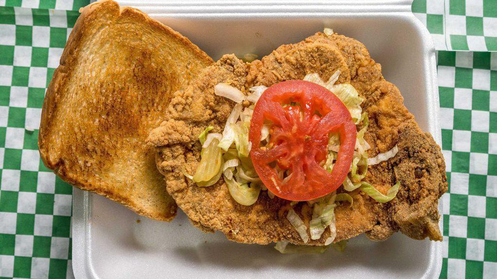 Pork Chop Basket · Deep Fried Battered or Grilled Pork Chop serve on Toasted Texas Toast with Mayo, Lettuce Tomato, Pickle (optional) and Fries