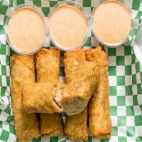 Boudin Eggrolls · Boudin wrapped in a eggroll deep fried with Cajun dipping sauce