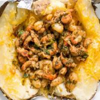 Seafood Baked Potato · Baked Potato Loaded with Sautéed Shrimp and Crawfish Tails, bacon, cheese, Chives, Sour Crea...