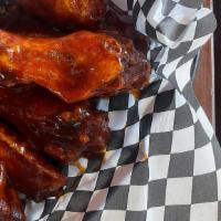 Bbq Wings · BBQ Sauce  six wings tossed in our Midwestern smoky barbecue sauce