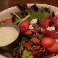 Royal Bleu · Mixed greens tossed in poppy seed vinaigrette, with strawberries, bleu cheese, and candied p...