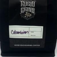 Colombian · Cupping notes: Bright, winey acidity, creamy body, sweet and nutty; dark chocolate, plum, mo...