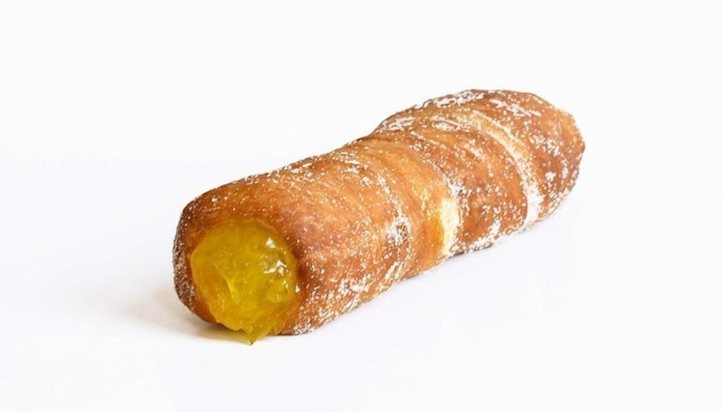 Pineapple Cannolo · Sweet, juicy pineapple filled and rolled in sugar