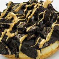 Old Dirty Bastard · Raised yeast doughnut with chocolate frosting, chocolate cream-filled cookies, and peanut bu...