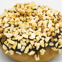 Peanut Cake · Plain cake doughnut with chocolate frosting and peanuts.