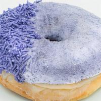 Grape Ape · Raised yeast doughnut with vanilla frosting, grape dust, and purple sprinkles.